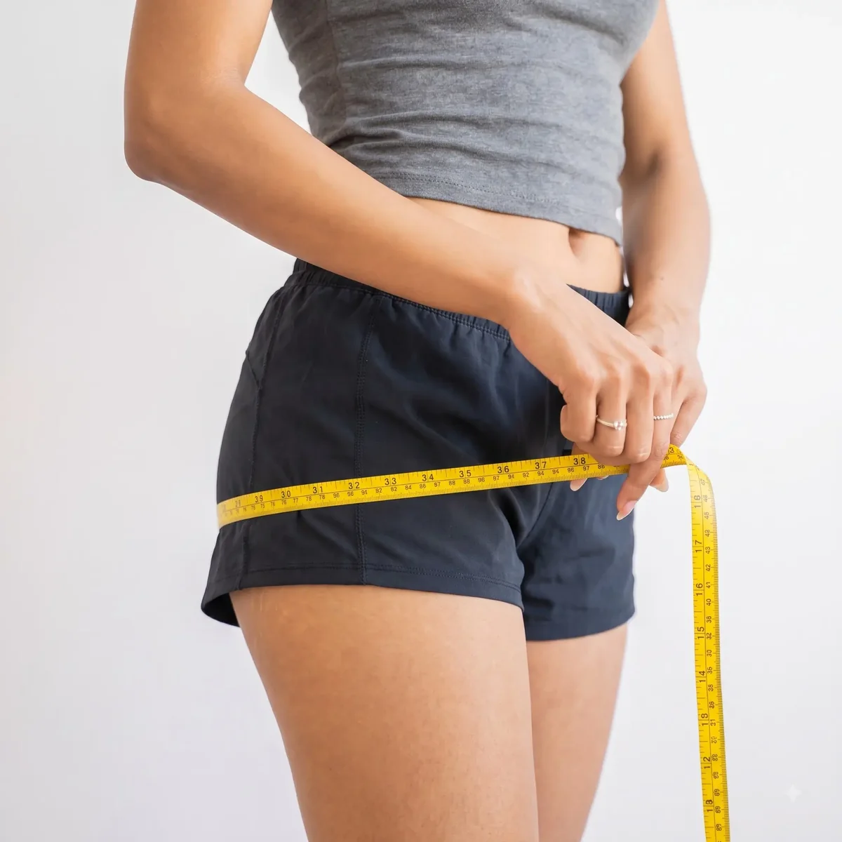 A tape measure around a waist